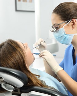 Woman undergoing dental exam